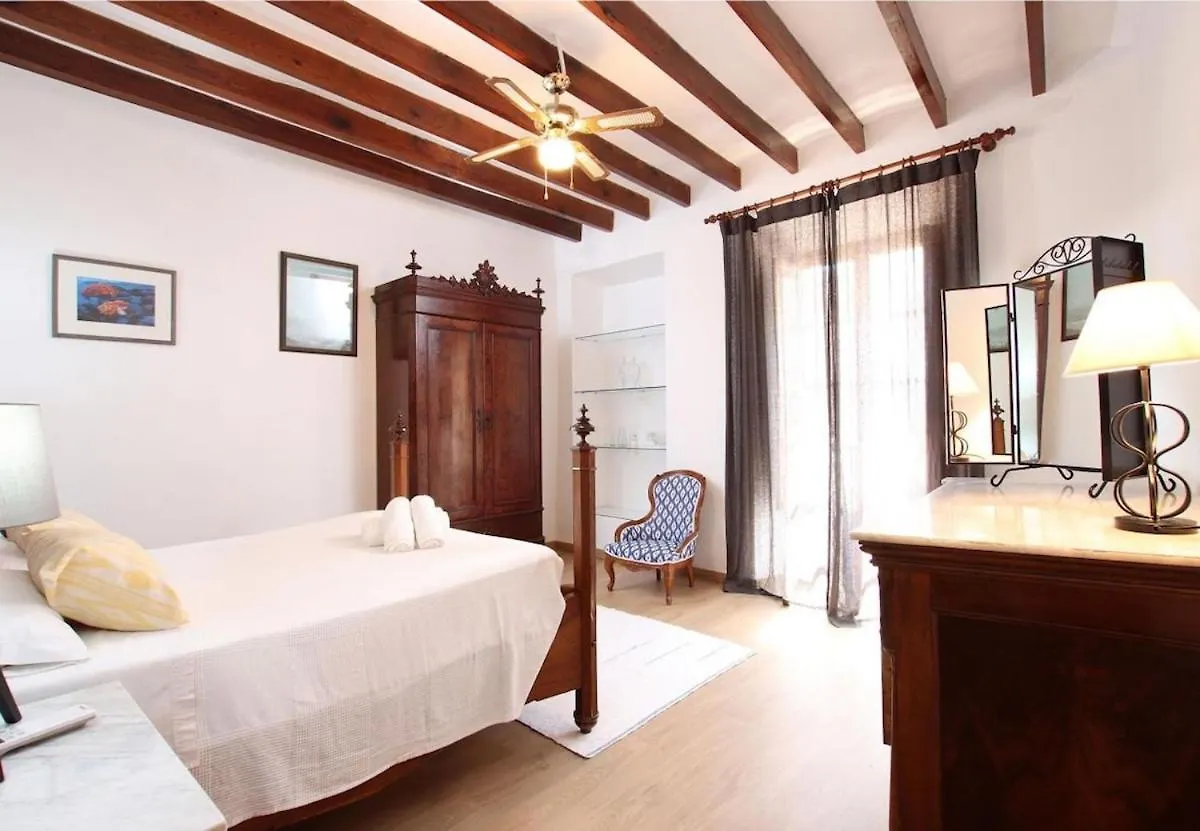 Traditional 3-Bedroom Semi-Detached House With Pool Located In The Historic Pollensa Town Center By Renthousing